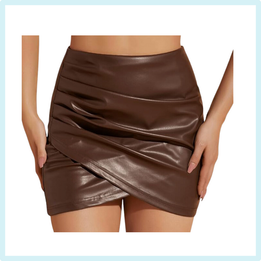 Explore the High Waist Ruched PU Leather Wrap Bodycon Mini Skirt at iHeartJLove.com. Soft fabric with stretch, features high waist, ruched details, and asymmetrical hem. Suitable for various occasions. Follow us on Instagram @iheartjlove for more fashion inspiration.